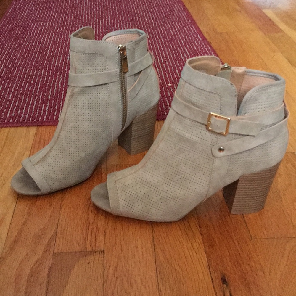 Tan ankle booties by Qupid